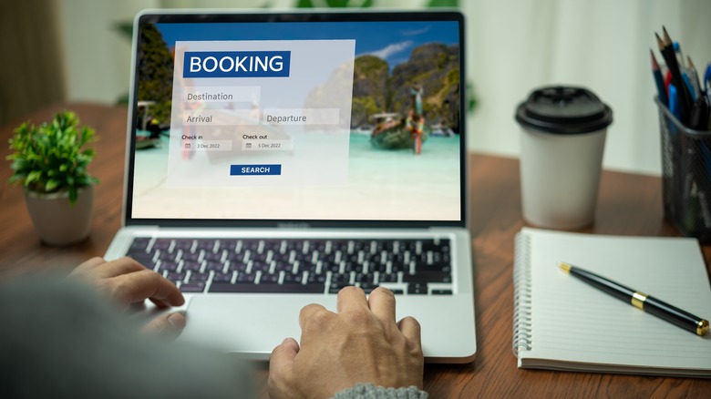 Laptop showing a hotel booking website
