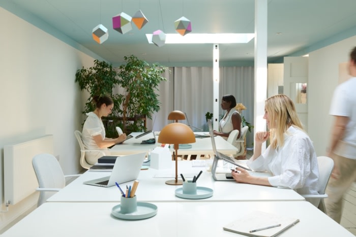 Bright open-plan office with people at work